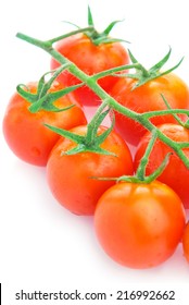 Closeup Of Cherry Tomatoes On The Vine , Isolated On White Background