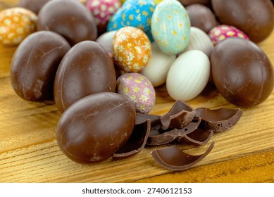 Close-up of chocolate Easter eggs on wooden background