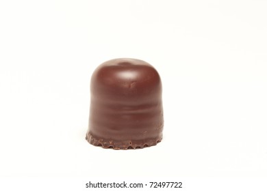 Closeup of chocolate marshmallow on white background