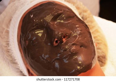 Closeup Of Chocolate Mask At Woman Face