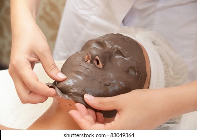 Closeup Of Chocolate Mask At Woman Face