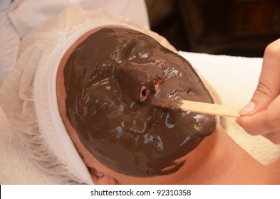 Closeup Of Chocolate Mask At Woman Face