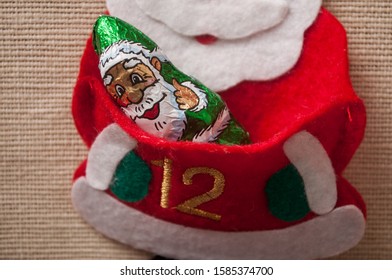 Closeup Of Chocolate In Shaped Santa Claus On Advent Calendar 