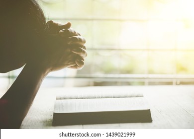 Closeup Of Christian Senior Woman Praying To God At Home In The Morning.