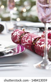 Closeup Of Christmas Cracker On Dining Table