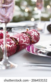 Closeup Of Christmas Cracker On Dining Table