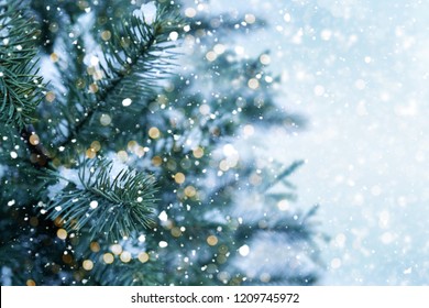 Closeup Of Christmas Tree With Light, Snow Flake. Christmas And New Year Holiday Background. Vintage Color Tone.