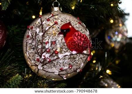 Closeup Of A Christmas Tree Ornament With Red Cardinal Closeup Of A Christmas Tree Ornament With Red Cardinal