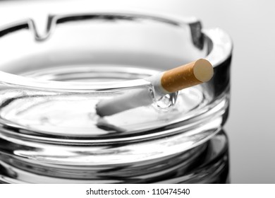 Closeup Of Cigarette On Ashtray