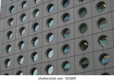 Close-up of circular windows on a skyscraper in Central, Hong Kong.