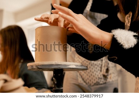 close-up in clay modeling studio applied art clay pottery old craftsmanship manual making of pottery smoothing out irregularities with a stack
