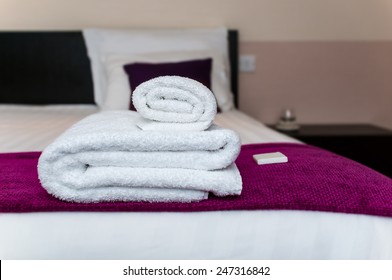 Close-up Clean Towels And Soap In Hotel Room