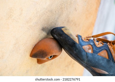 Close-up of climbing shoes training in artificial climbing wall outdoors. Climber detail. - Powered by Shutterstock - Get 15% off with code: PIKWIZARD15