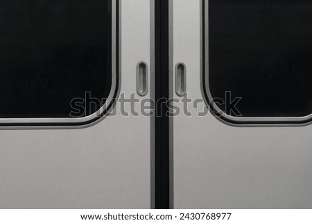 closeup closed metro train automatic door