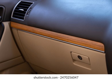 Close-up of closed storage compartment inside car