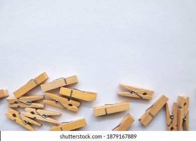 Close-up of clothes pin on white back ground. Clothes peg brown color on white back ground ,wood made. Mini Wooden Clips pack Natural Paper Photo Clips Bookmark Clothes Pegs vintage look papercraft