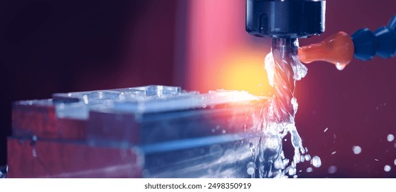 Closeup CNC milling machine during operation. Produced cutting metal parts, banner background of industry heavy factory. - Powered by Shutterstock