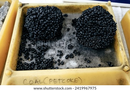 Closeup of Coal (pet coke) displayed in a bowl. Stock photo © 