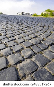 closeup of a cobblestone road surface