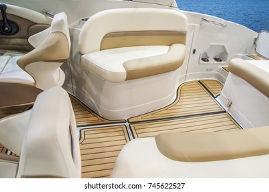 Closeup of cockpit of luxury yacht. Cockpit of luxury seagoing boat. interior from wood and leather.