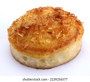 Closeup Of A Coconut Sponge Cake On A White Background