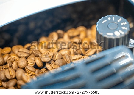 Close-up of Coffee Beans in a Roasting Machine During the Roasting Process
