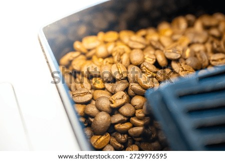 Close-up of Coffee Beans in a Roasting Machine During the Roasting Process