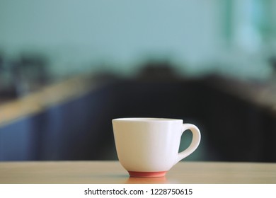 Close-up Of Coffee Cup On Table In Meeting Room Selective Focus And Shallow Depth Of Field