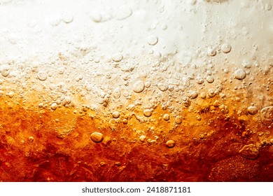 close-up cola background,Cola and Ice, food background, Cola close-up, design element. Beer. Macro bubbles, ice, bubbles, background, ice cubes, abstract background.