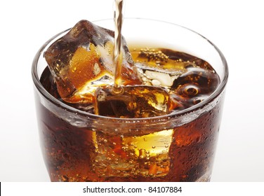 Closeup Of Cola Being Poured