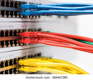 Closeup Of  Colored Computer Network Cables  Connected To A  Switch