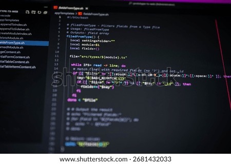 Close-up of colorful Bash shell script code on screen showing fieldsFromType.sh with variables, regex, and while loop, symbolizing DevOps, automation, programming, and digital technology background.