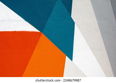 Closeup of colorful blue red gray white urban wall texture. Modern pattern for wallpaper design. Creative urban city background. Abstract open composition. Minimal geometric style, solid colors