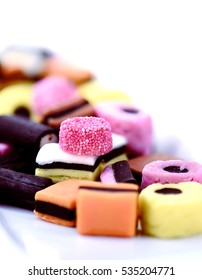 Closeup colorful image of liquorice allsort candy sweets with selective focus, the perfect image for your party invitation cover art. Copy space.