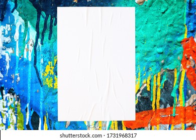 Closeup Of Colorful Messy Painted Urban Wall Texture With Wrinkled Glued Poster Template . Modern Mockup For Design Presentation. Creative Urban City Background. 