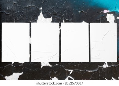 Closeup Of Colorful Messy Painted Urban Wall Texture With Four Wrinkled Glued Poster Templates. Modern Mockup For Design Presentation With Clipping Path. Creative Urban City Background. 