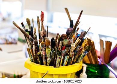 Close-up Of Colorful Paint Brushes In Middle School Art Class