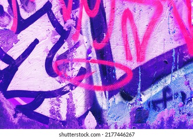 Closeup of colorful pink, purple, blue urban wall texture. Modern pattern for wallpaper design. Creative modern urban city background for advertising mockups. Grunge messy street style background