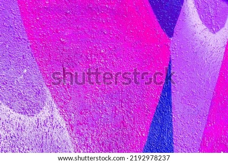 Closeup of colorful pink, purple, coral urban wall texture. Modern pattern for wallpaper design. Creative modern urban city background for advertising mockups. Minimal geometric style, solid colors