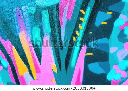 Closeup of colorful teal, pink and yellow urban wall texture. Modern pattern for wallpaper design. Creative modern urban city background for advertising mockups. Minimal geometric style, solid colors