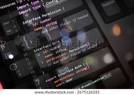 Close-up of colorful TypeScript code for server and socket connection overlayed on a computer keyboard. Perfect for web developers, programmers, tech blogs, coding, and software development content.