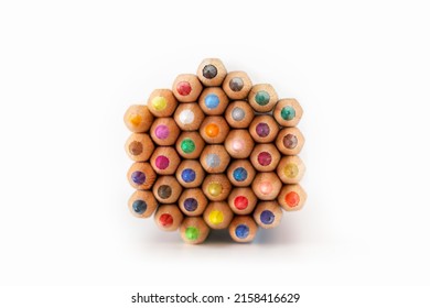 Closeup of coloring pencils isolated on white background, arts and crafts, back to school concept. Shallow depth of field.