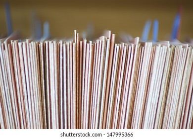 Closeup Of Colour Coded Filing System For Folders