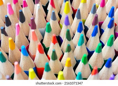 Close-up Of Coloured Pencil Tips Standing Upright. Art Supplies. Focus Towards The Back.