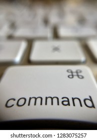 Close-up of a command key on a keyboard