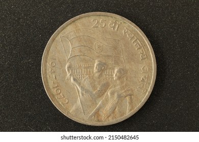 Closeup of a commemorative coin of India depicting  25th Anniversary of Independence 1947-1972.