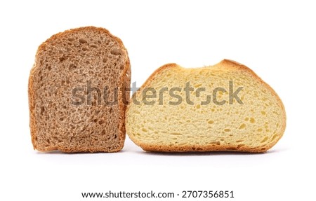 Close-up comparison of two bread slices: one whole wheat and one white bread, both cut to show texture, crumb structure, and color differences. Isolated on a white background.