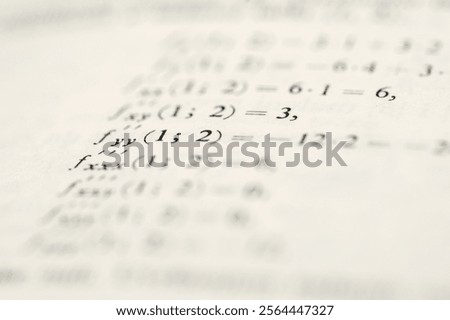 Close-Up of Complex Mathematical Equations and Derivatives with Detailed Notations on White Paper Background [[stock_photo]] © 