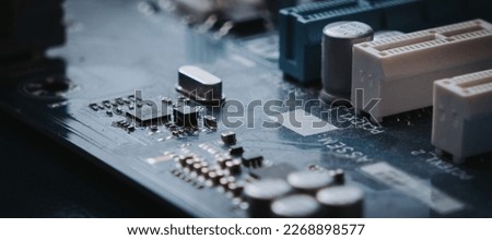 Close-up computer board, chipset, electronics, small electronics board, technology, high-tech chipset, circuitboard. unique electronic device, 2023 model, conductors, microchips,  socket, miniature