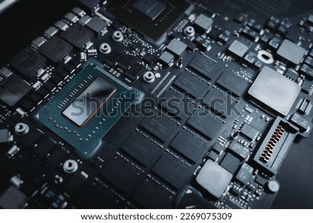 Close-up computer board, chipset, electronics, small electronics board, technology, high-tech chipset, circuitboard. unique electronic device, 2023 model, conductors, microchips, CPU socket, miniature